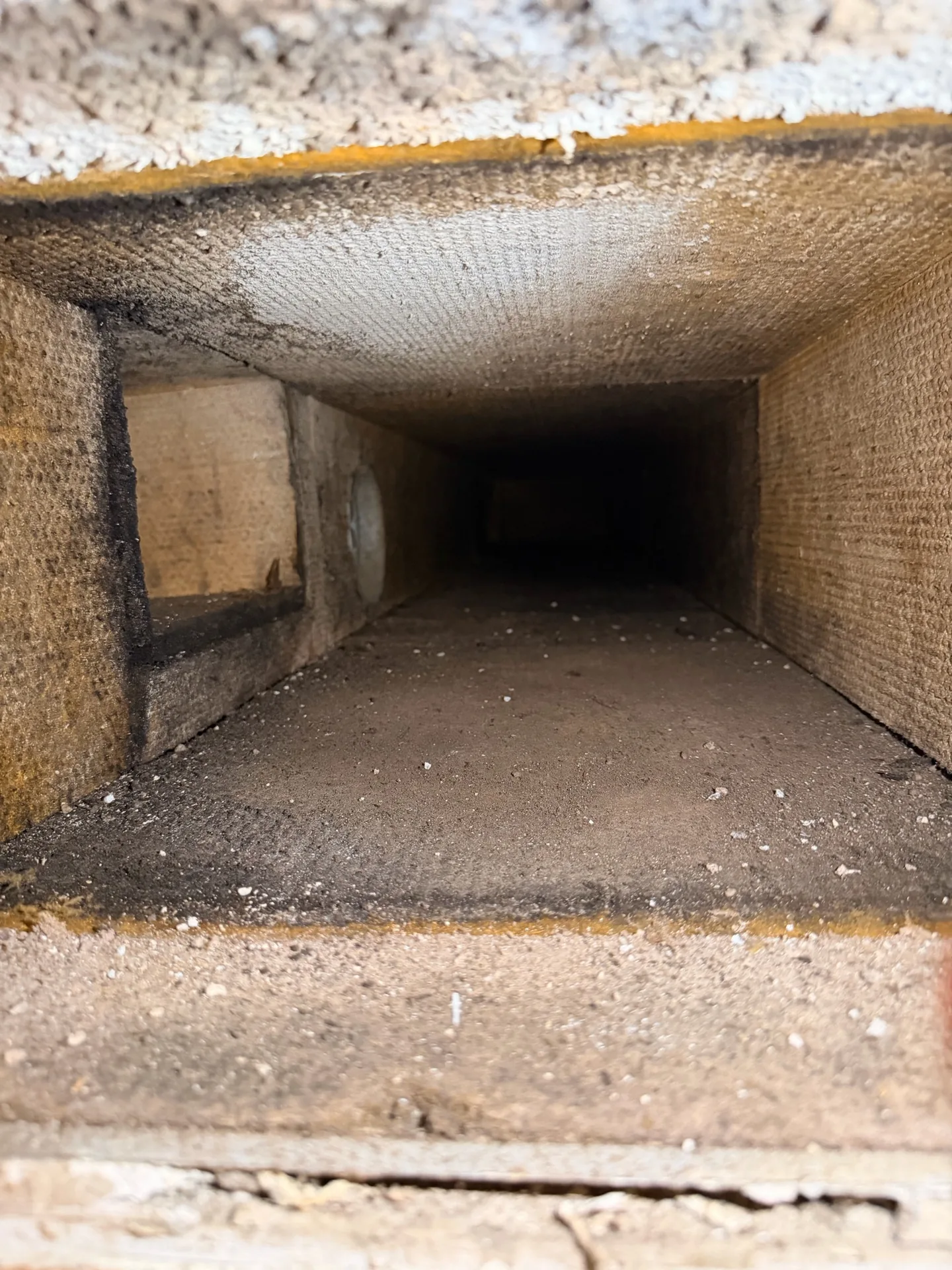 Air duct before professional cleaning